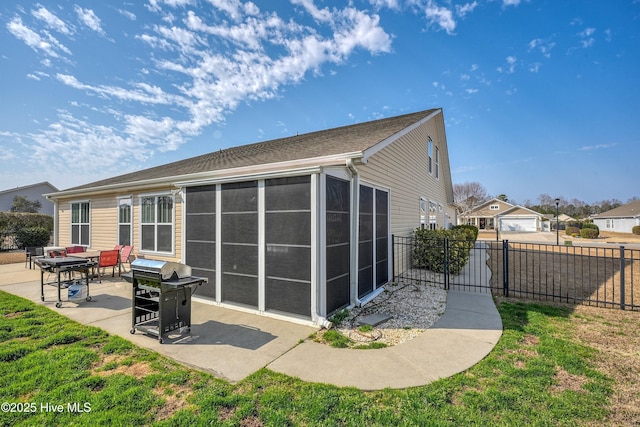 back of property featuring a patio