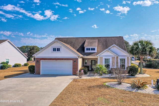 view of front of home featuring a garage and a front lawn