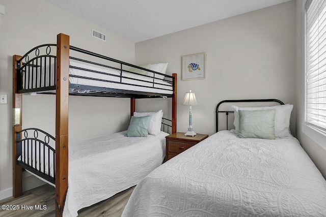 bedroom featuring hardwood / wood-style flooring