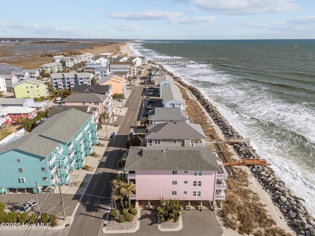 aerial view with a beach view, a residential view, and a water view