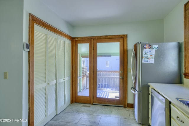 interior space featuring light tile patterned flooring