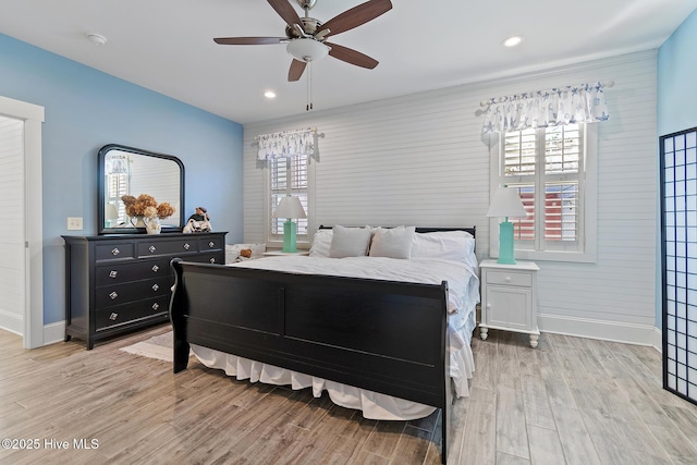 bedroom featuring ceiling fan and light wood-type flooring