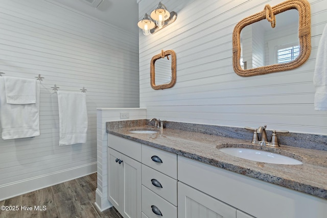 bathroom featuring vanity and hardwood / wood-style flooring