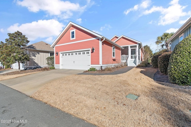 front facade featuring a garage and a sunroom