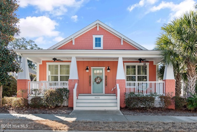 view of front of property featuring ceiling fan and covered porch