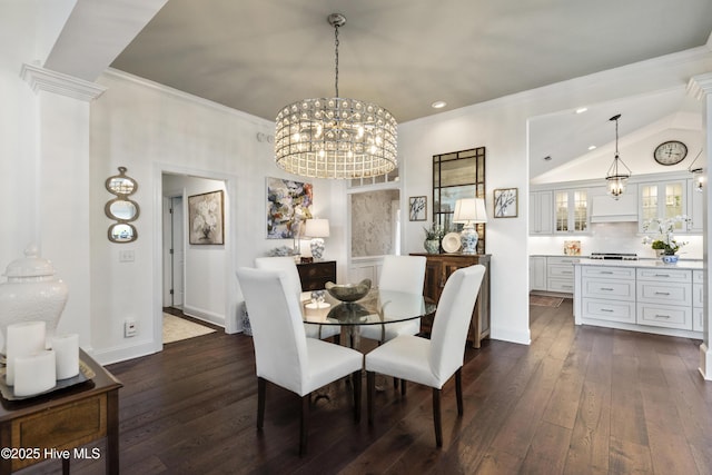 dining space featuring dark wood-type flooring, recessed lighting, crown molding, baseboards, and a chandelier