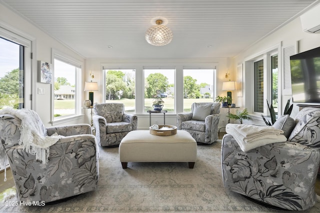 sunroom / solarium with an AC wall unit