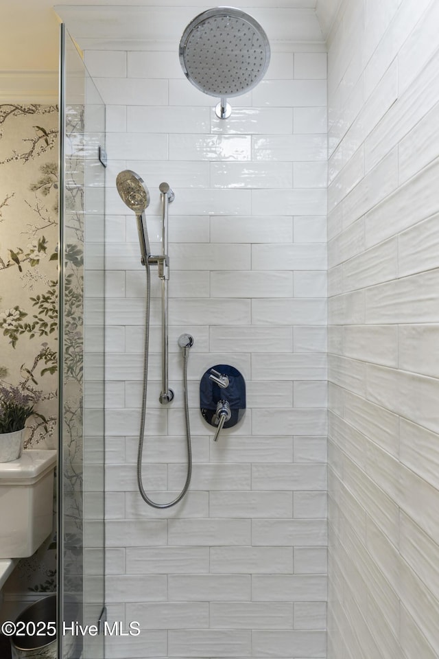 full bath featuring tiled shower