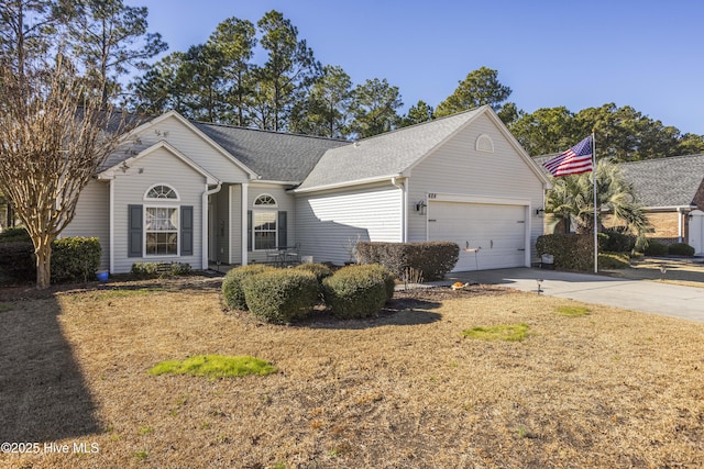 ranch-style house featuring a garage