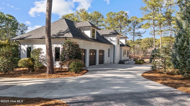 view of property exterior with a garage