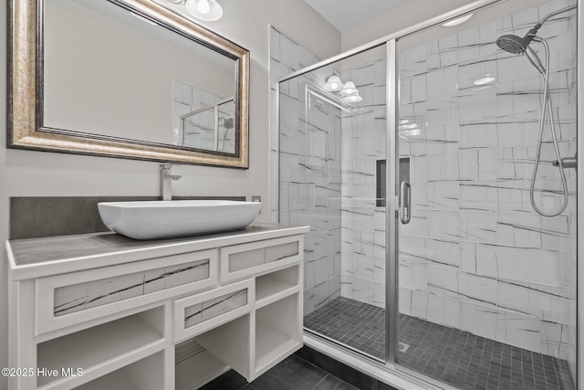 bathroom featuring vanity and walk in shower