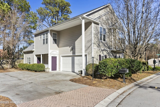 view of property exterior featuring a garage