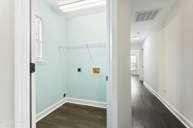 laundry room featuring dark wood-type flooring, washer hookup, and hookup for an electric dryer