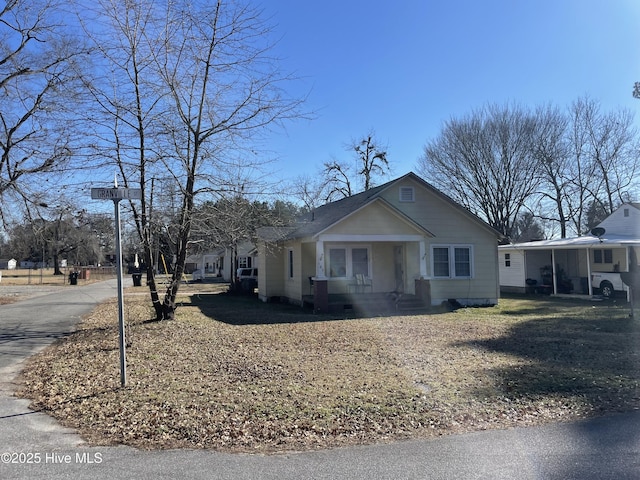 bungalow-style home with covered porch