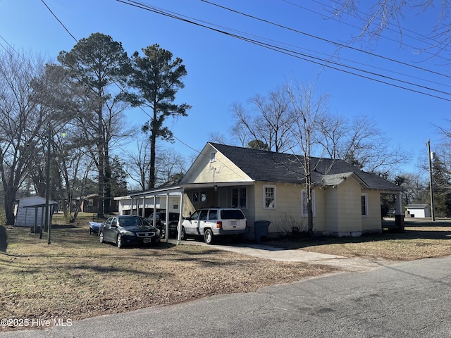 view of property exterior with a shingled roof