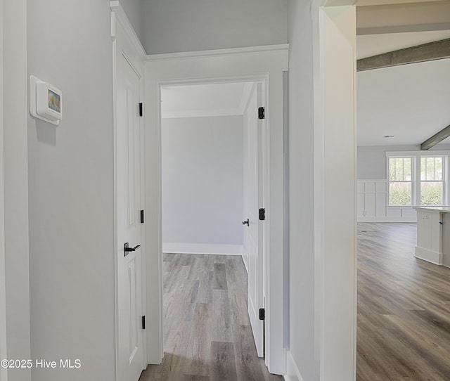 hall with light hardwood / wood-style flooring