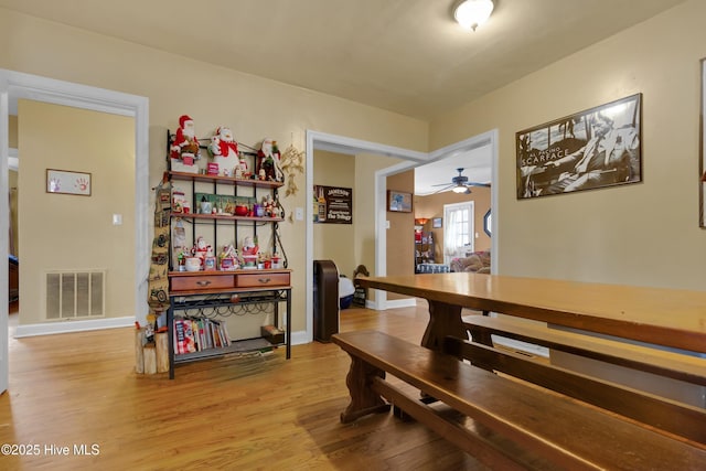 dining space featuring light hardwood / wood-style flooring