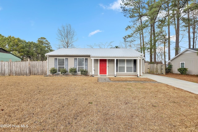 ranch-style house with a front lawn