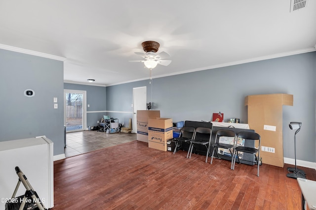 home office with hardwood / wood-style floors, ornamental molding, and ceiling fan