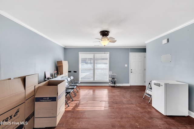 interior space featuring crown molding, ceiling fan, and dark hardwood / wood-style flooring