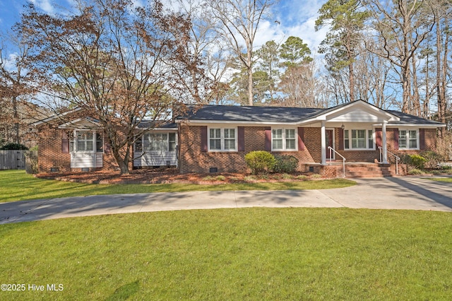 ranch-style house with a front lawn