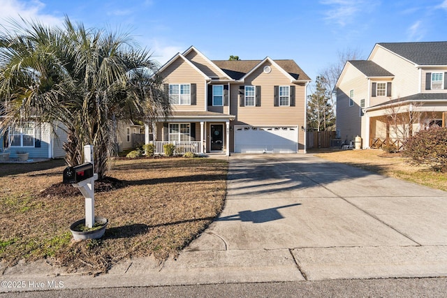 view of front of house featuring a porch and a garage