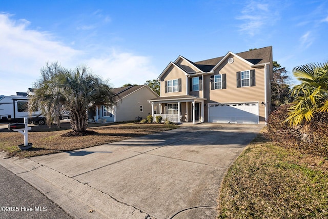 view of front of property featuring a garage and a porch