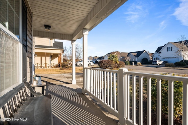 balcony featuring covered porch