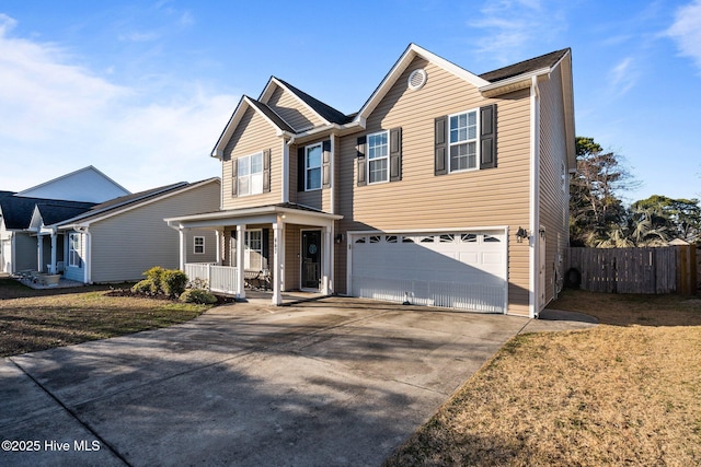 view of front facade with a garage and covered porch