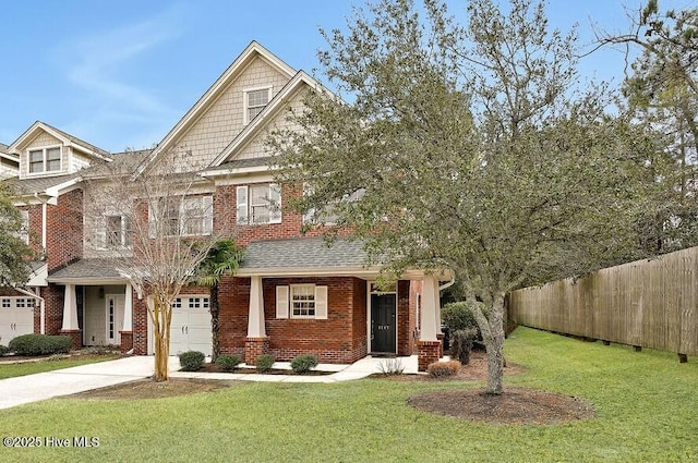 craftsman-style home with a garage and a front yard