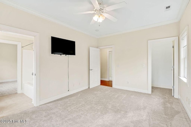 unfurnished bedroom with ceiling fan, ornamental molding, and light carpet