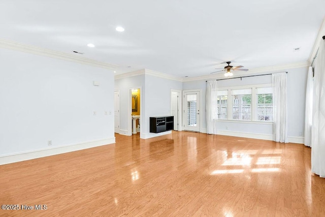 unfurnished living room featuring light hardwood / wood-style flooring, ornamental molding, and ceiling fan