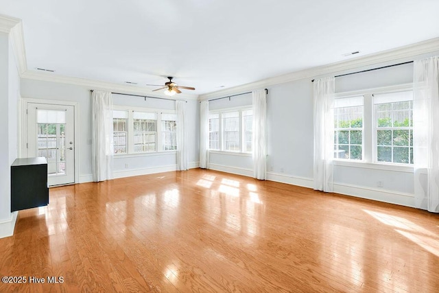 unfurnished living room featuring crown molding, ceiling fan, and light wood-type flooring