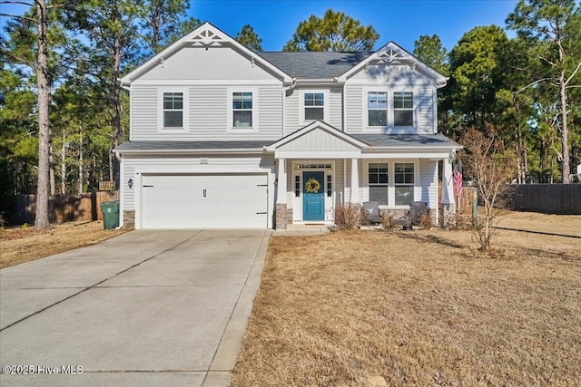 craftsman-style home featuring a porch and a garage