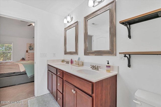 bathroom with vanity and toilet