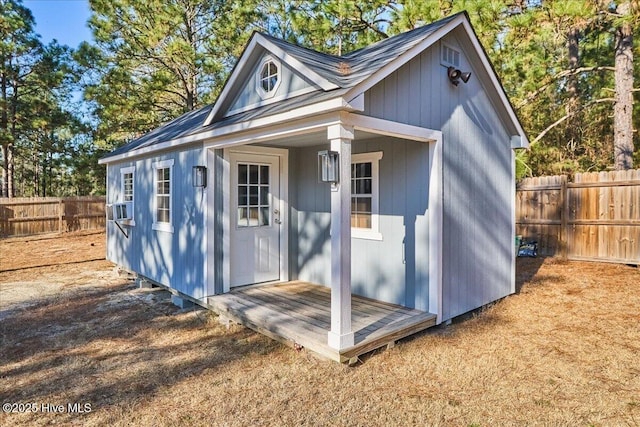 view of outbuilding featuring cooling unit