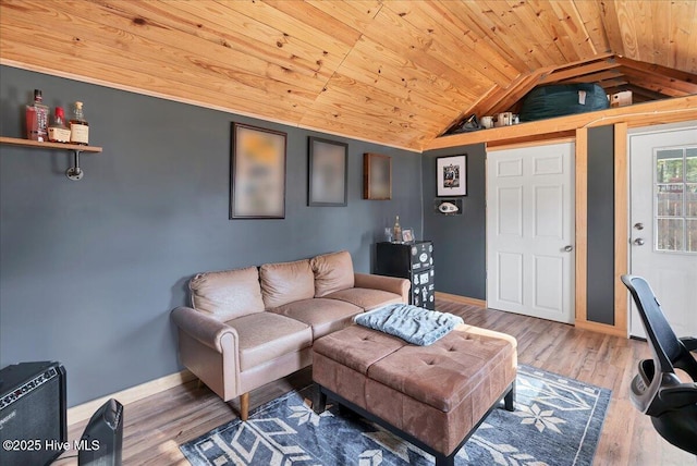 living room featuring vaulted ceiling, hardwood / wood-style floors, and wooden ceiling