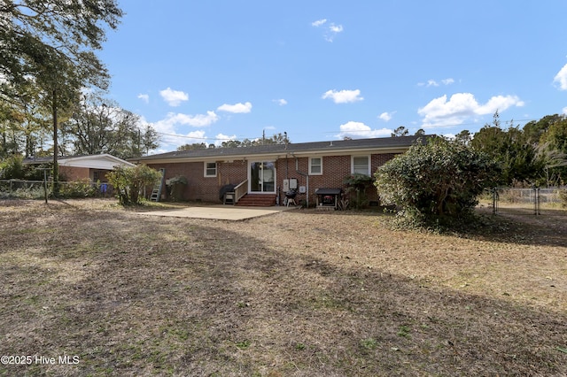 back of house with a patio area