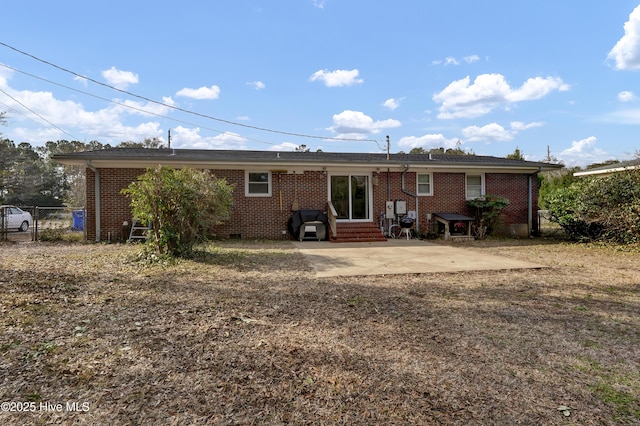 rear view of house with a patio area