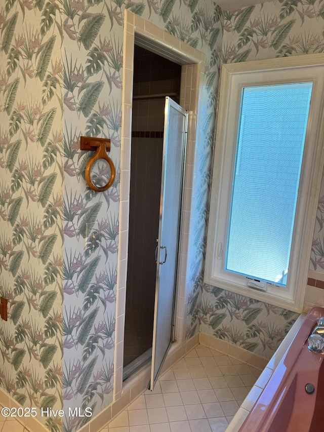 bathroom featuring tile patterned floors and walk in shower