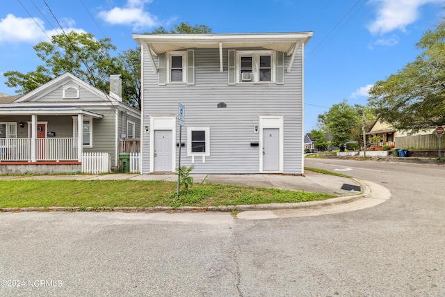 view of front of home featuring covered porch