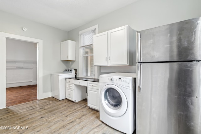 washroom with baseboards, laundry area, washer hookup, and light wood-style floors