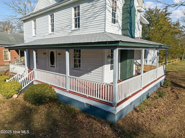 farmhouse-style home with covered porch