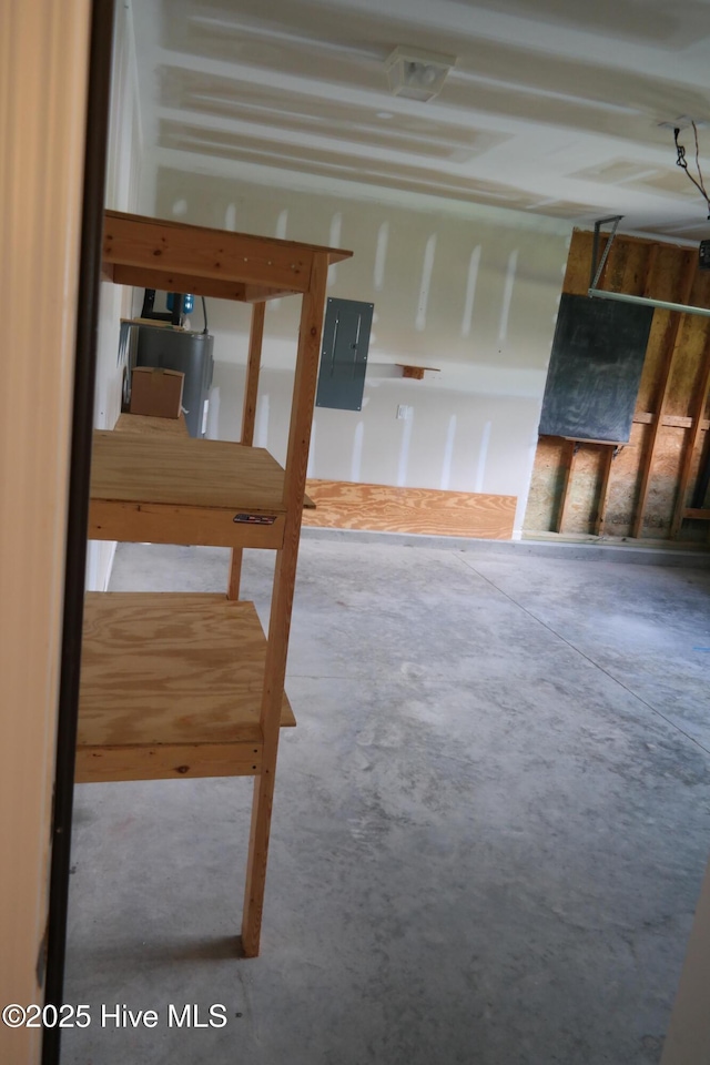 interior space featuring a garage and concrete floors