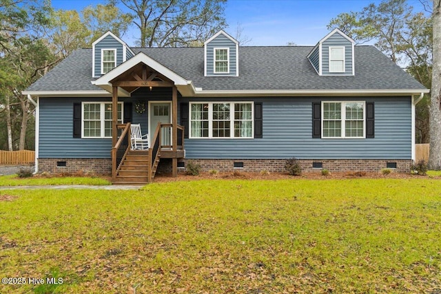 cape cod house with a front yard