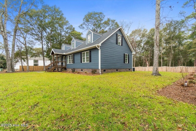 view of home's exterior with a lawn