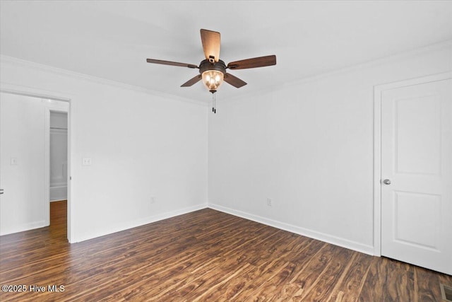 unfurnished room featuring crown molding, dark wood-type flooring, and ceiling fan