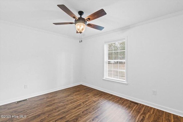 unfurnished room featuring ornamental molding, ceiling fan, and dark hardwood / wood-style flooring