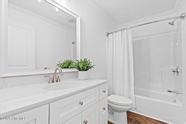 full bathroom with hardwood / wood-style flooring, vanity, shower / tub combo, toilet, and crown molding