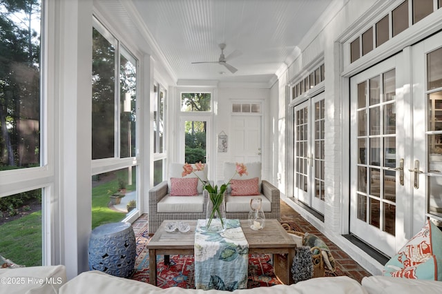 sunroom / solarium with ceiling fan